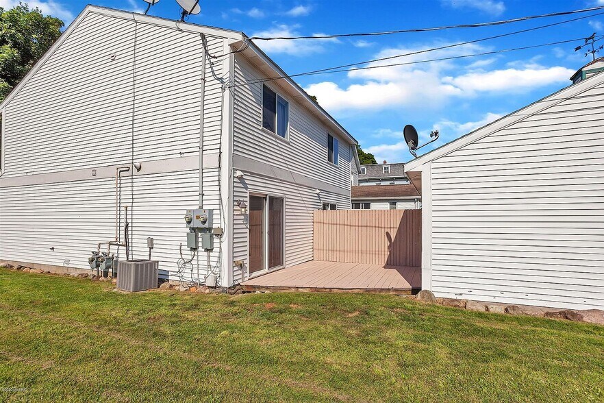 Patio with privacy fence - 203 E. Main St.
