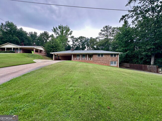 Building Photo - 5506 Woodland Dr