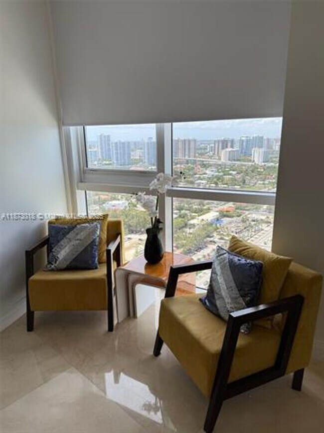 Building Photo - 18201 Collins Ave