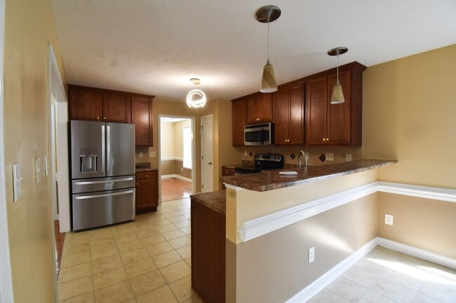 Building Photo - Coming Soon!! 4 Bedroom 2.5 Bath Nicely Renovated with Updated Fixtures! - No Pets