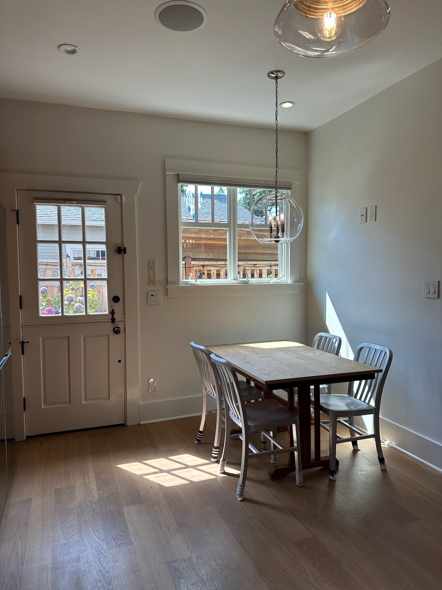 Everyday eating area, access to fully fenced backyard - 211 W Boston St