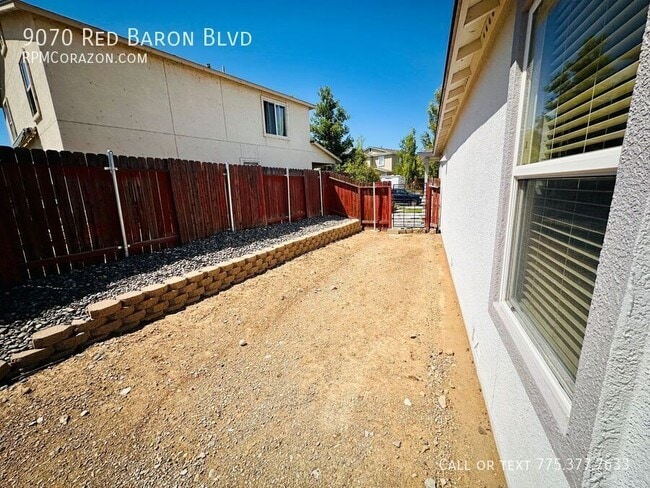 Building Photo - 9070 Red Baron Blvd