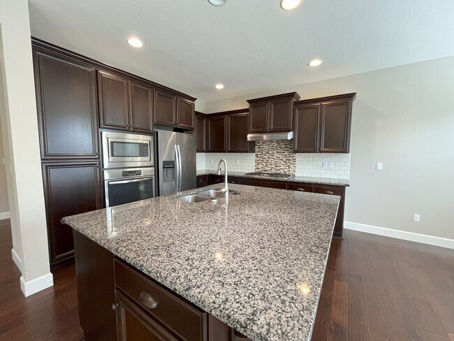 Building Photo - Spacious 4-Bedroom + Bonus Room with Moder...