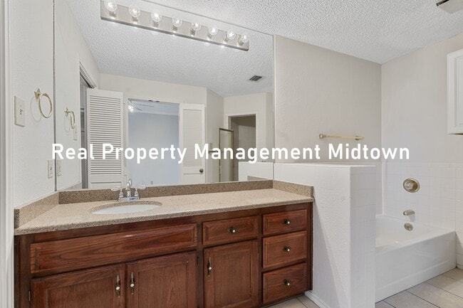 Building Photo - Charming Condo in Established Community of...