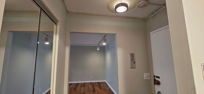 Building Photo - Short walk to Longwood! Steps to T! Large 1 bedroom w/enclosed porch! Garage parking incl.