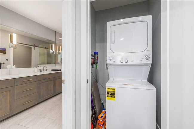 Building Photo - COME HOME TO REFINED DOWNTOWN LUXURY CONDO...