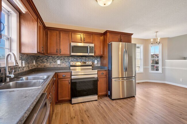 Building Photo - Perfect Family Layout with Office & Large Fenced Backyard