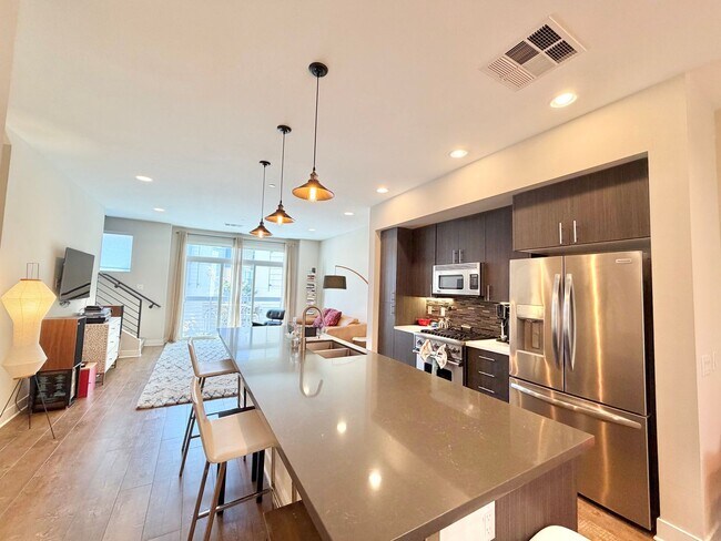 Building Photo - Furnished 3-BR/3-BA Townhouse w/ Giant Roof deck, 2-Car Garage, EV Hookup