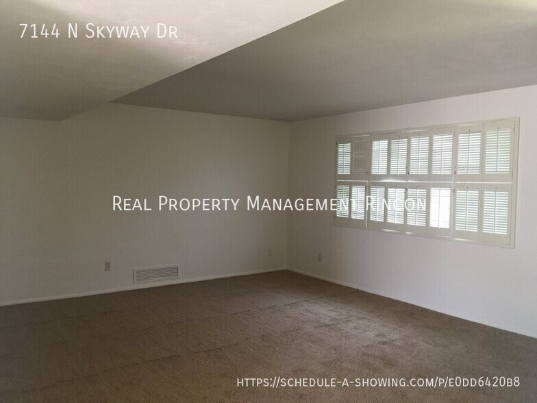 Building Photo - 7144 N Skyway Dr