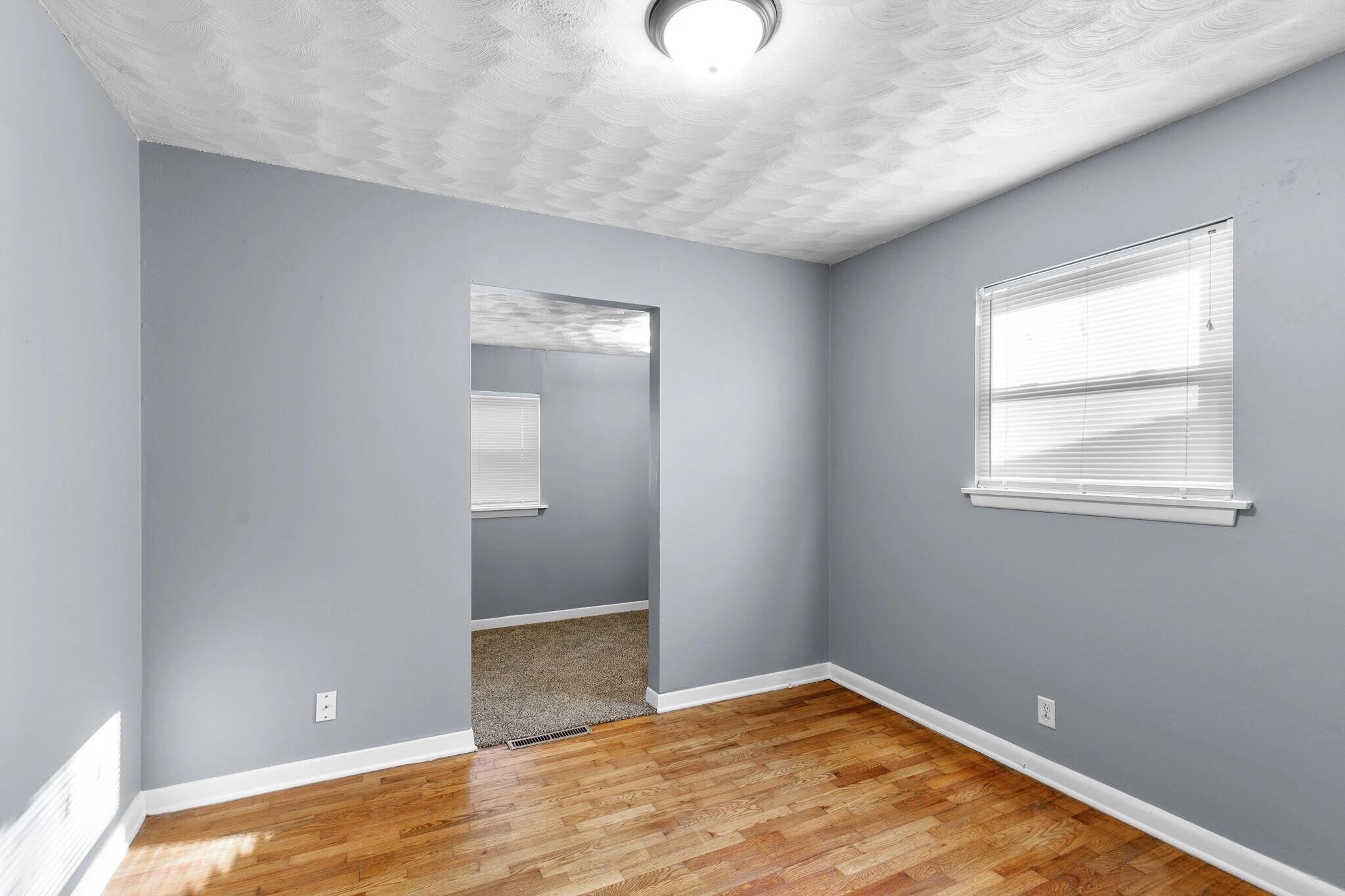 Bdrm 2 w/ small carpeted addition - 1625 E Nora St