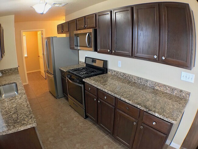 Building Photo - Northeast El Paso 4 Bed Refrig A/C