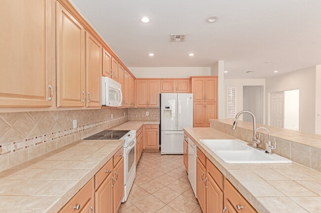 Building Photo - "Charming 2-Bedroom + Den Oasis with Spaci...