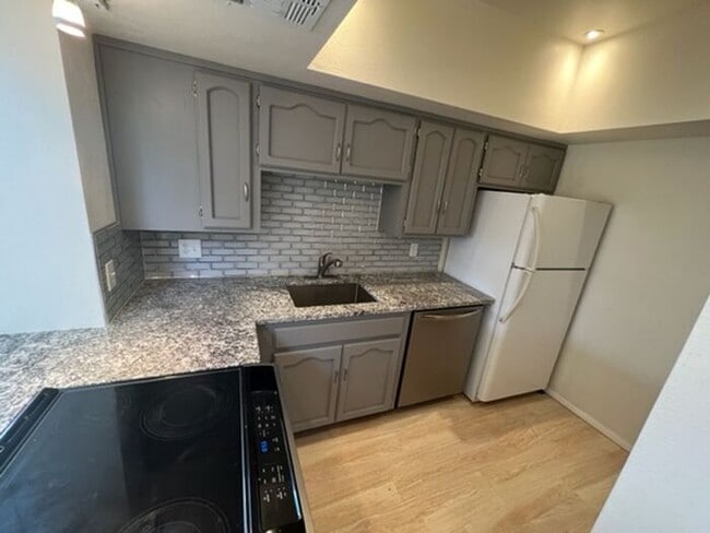 Building Photo - Pending/ Rented - One Bedroom Condo on Riv...