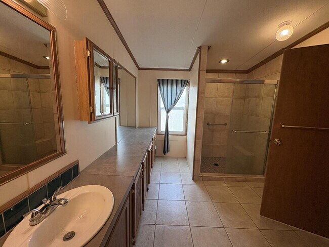 Building Photo - charming 3-bed, 2-bath home is located in the highly desired Strawberry Crest 55+ community