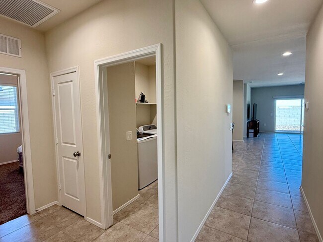 Building Photo - Large Newer-Built 4 Bedroom 2 Bathroom 3 Car Garage Home in Coolidge!