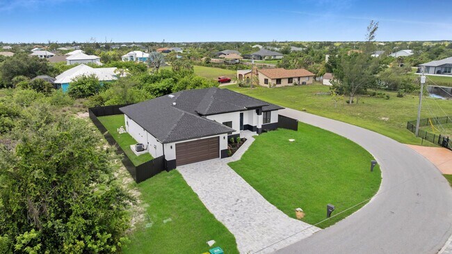 Building Photo - Brand-New Pool Home for Rent – Port Charlo...