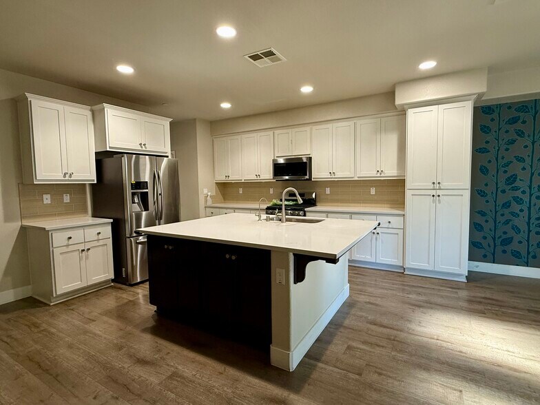 Kitchen- Tall cabinets. Spacious! - 27 Rogers Ln