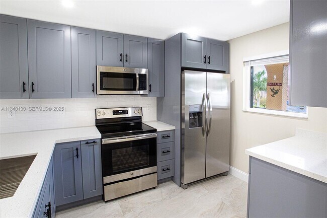 Building Photo - 9431 Boca Cove Cir