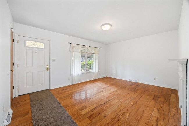 Building Photo - Classic Brick Ranch with 24x24 Workshop, Fenced Yard & Garden Beds