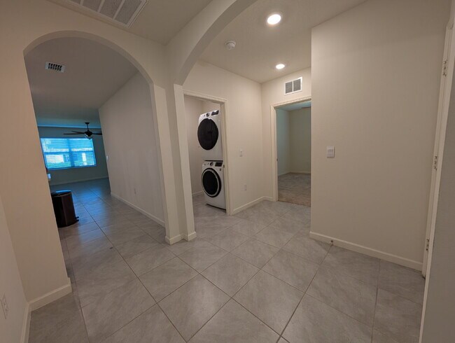 Building Photo - Modern 4-Bedroom Home with Large Backyard in Quiet SW Palm Bay