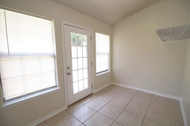 Building Photo - 3BR/2BA North Pensacola Brick Home with Bonus Room, Vaulted Ceilings & Privacy-Fenced Backyard Ne...