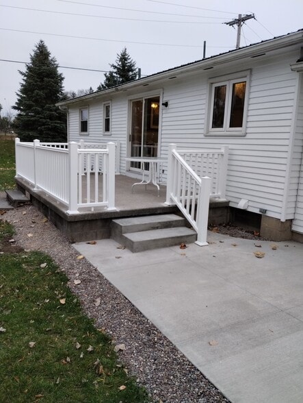 rear patio with stairs to lower patio - 8306 Park Rd