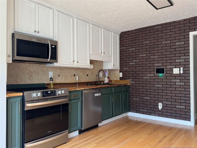 Building Photo - 4023 Des Planes Ave