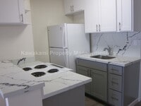 Building Photo - Conveniently Located, Renovated Condo w/Pa...