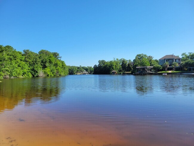 Building Photo - Riverfront Living with Private Boat Launch