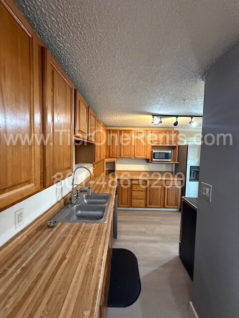 Building Photo - NO deposit option available for qualified ...