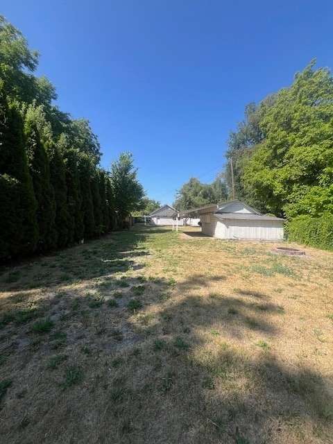 Building Photo - Charming 2 Bed, 1 Bath Single-Family Home with Large Backyard & RV Hookups!