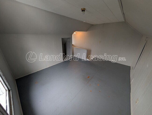 Building Photo - Updated Two-Bedroom Townhome with Lawn Care Included