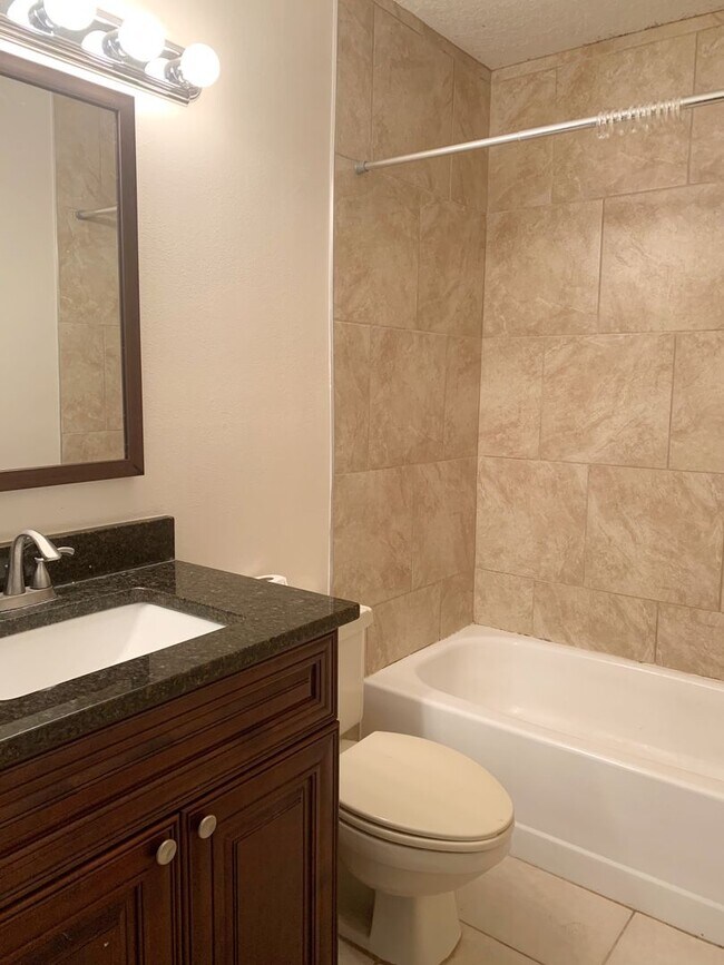 Building Photo - Cozy 3/2 Fenced Home on a Corner Lot