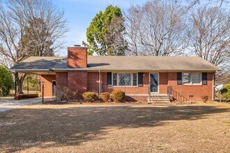 Building Photo - Elon - Large Brick Home, Hardwoods, Granite Counter-Tops, SS Appliances, Fire Place, Carport - Mu...