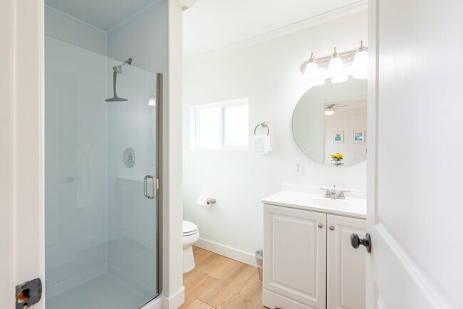 Building Photo - Enjoy stunning sunsets and beach living at its finest, Short Walk to Beach