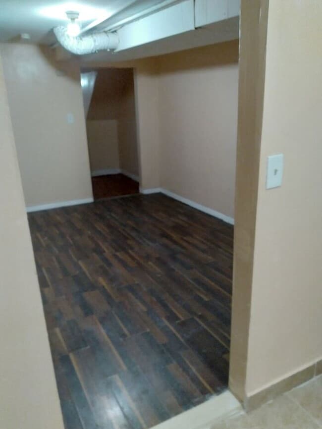 Building Photo - 3 bedrooms on the 3rd Floor with Central Hot Air, and an Available backyard