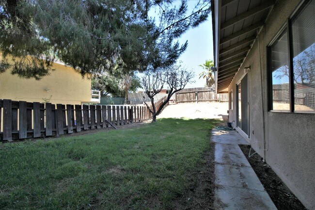 Building Photo - Victorville Green Tree Home- Refurbished 4 Bedrooms, 2 Bathrooms, New Paint,
