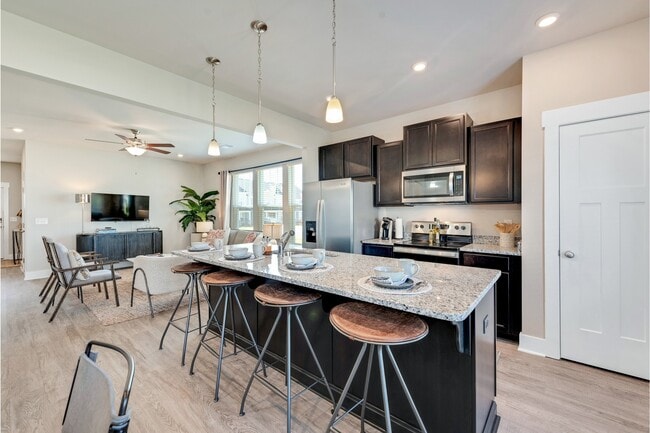 Modern Open Kitchen with Large Island - Covey Homes Addison