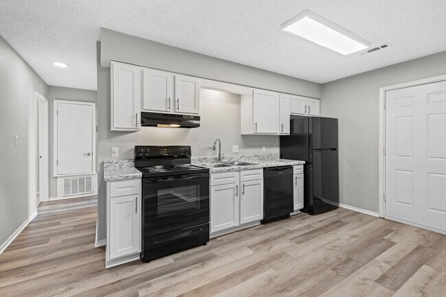 Building Photo - Cozy 2 Bedroom Duplex with Fireplace & Spacious Backyard!