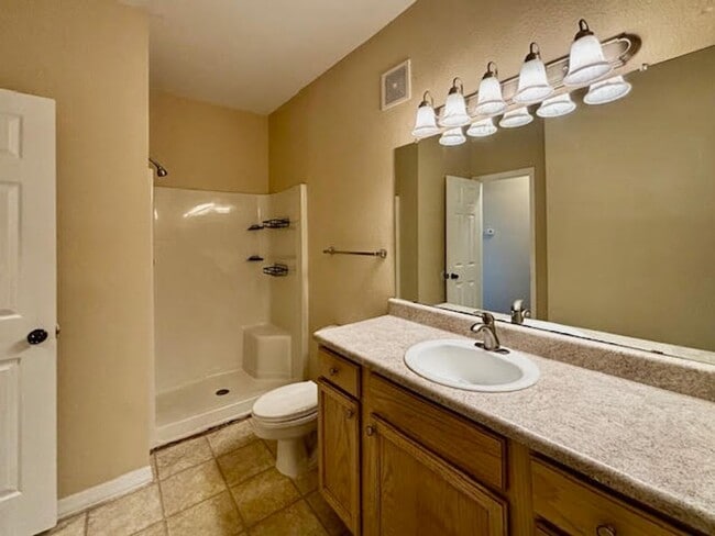 Building Photo - “3/2 Condo w/ GARAGE in Gate Parkway Area
