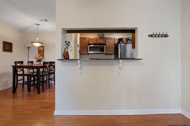 Building Photo - WATERFRONT LIVING! BEAUTIFULLY APPOINTED CONDO ON THE BAYOU IN OS SCHOOL DIST - FULLY FURNISHED
