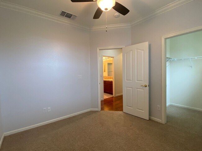 Building Photo - CLEAN AND SPACIOUS 4 BED, 2.5 BATH WITH COVERED BACK PATIO AND LUSH LANDSCAPING IN WESTLAKE COMMU...