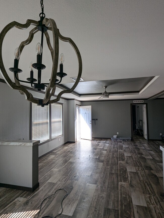Dininning room looking over into the living room - 179 Davis Rd