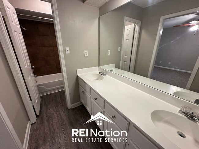 Building Photo - CORDOVA COVE CHARMER! 3BR/2BA | High Ceilings & Brick Fireplace | 2-Car Garage!