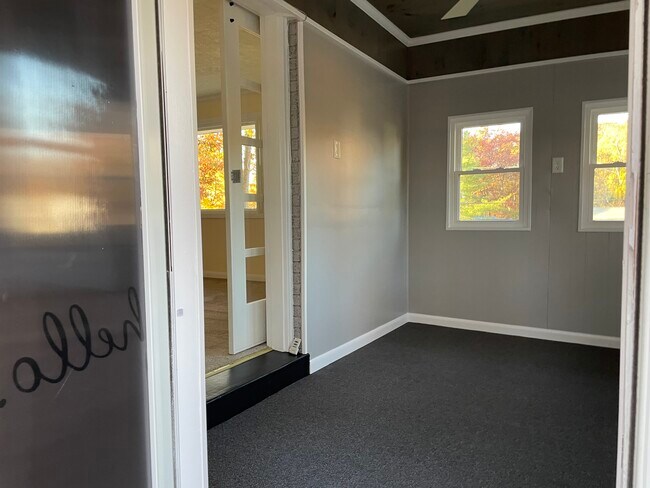Side porch off living room with barn door - 48 Hope Rd