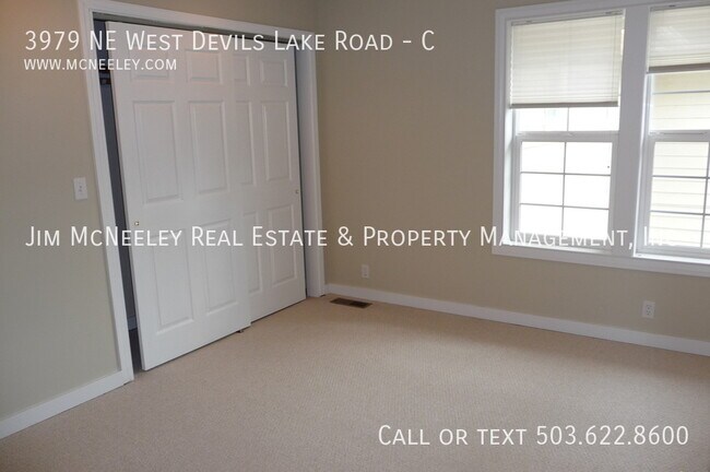 Building Photo - 3979 NE West Devils Lake Rd