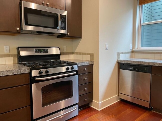 Building Photo - Light and Bright Greenwood Townhouse