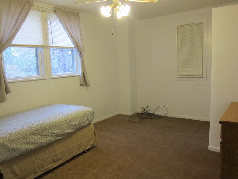 Bedroom #3 is has a nice closet on the right side. - 1445 South Center Street