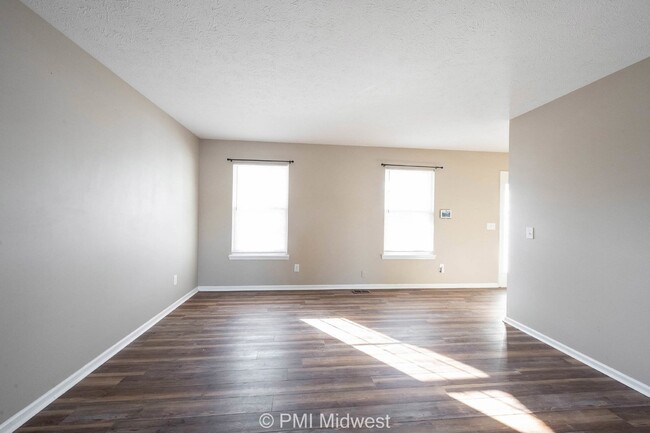 Building Photo - "Spacious 4-Bedroom Gem with Finished Base...