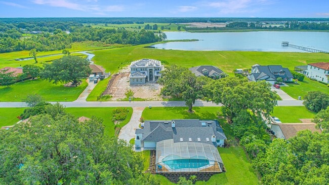Building Photo - Beautifully Updated 3/2 Pool Home with Large Backyard in Lake Ajay (Gated Community)